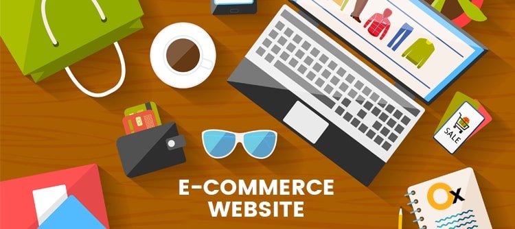 E-commerce website homepage on laptop and some products placed around the laptop