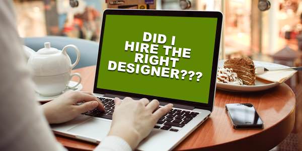 A man working on laptop showing the question did i hire the right designer